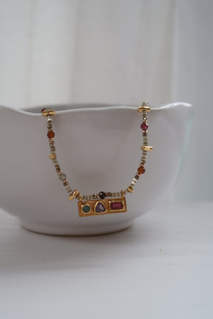 Beaded Jewel Toned Pendant Necklace